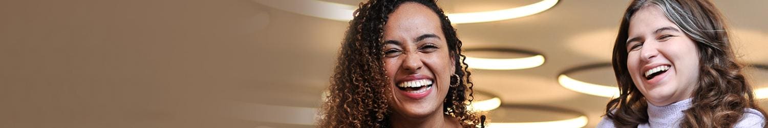 Two women smiling
