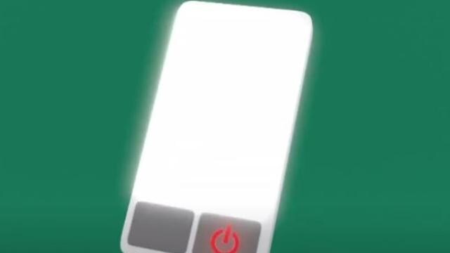 Uma tela de smartphone brilhante com um símbolo de botão liga/desliga na parte inferior, sobre um fundo verde.